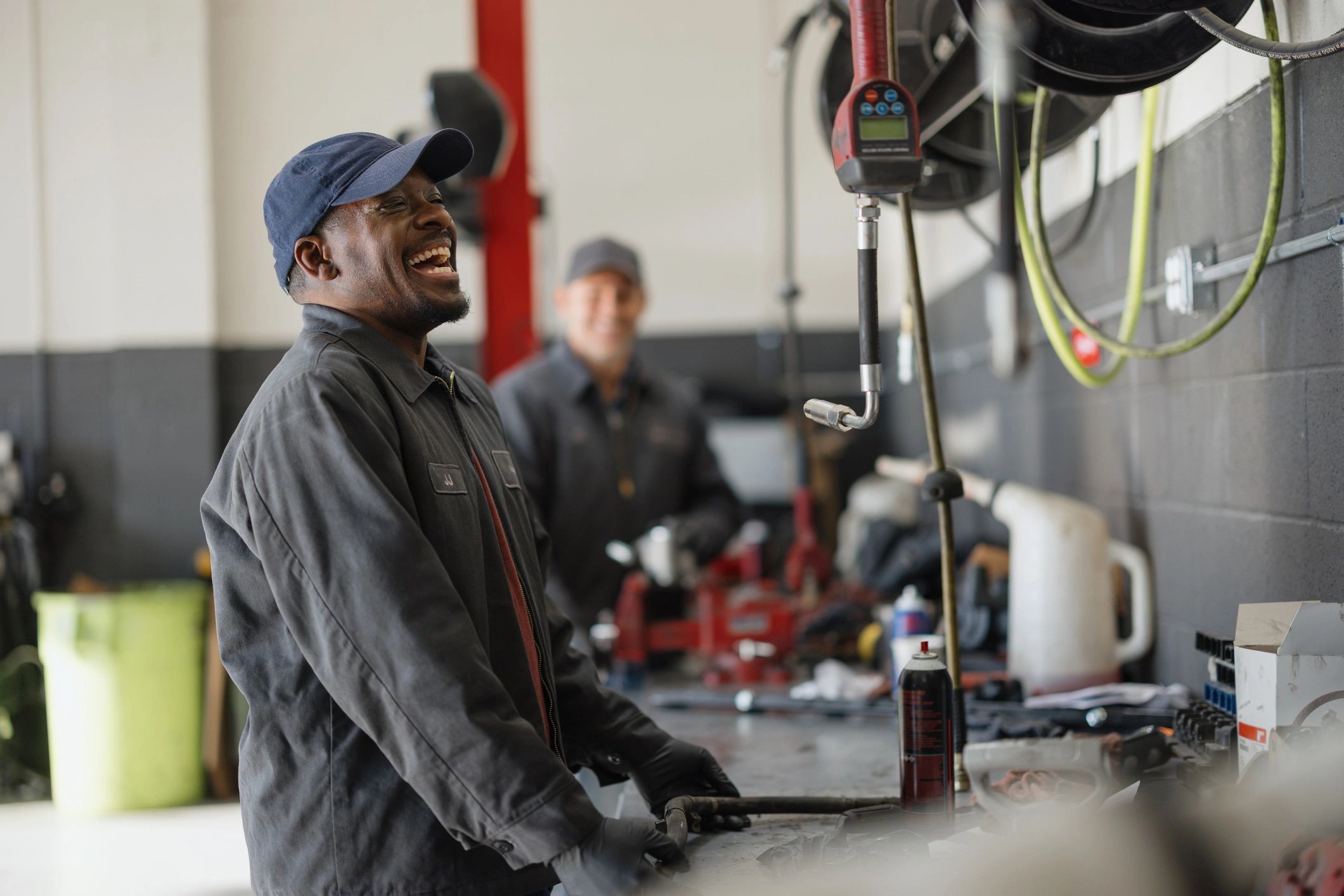 mechanic inspecting truck in workshop
