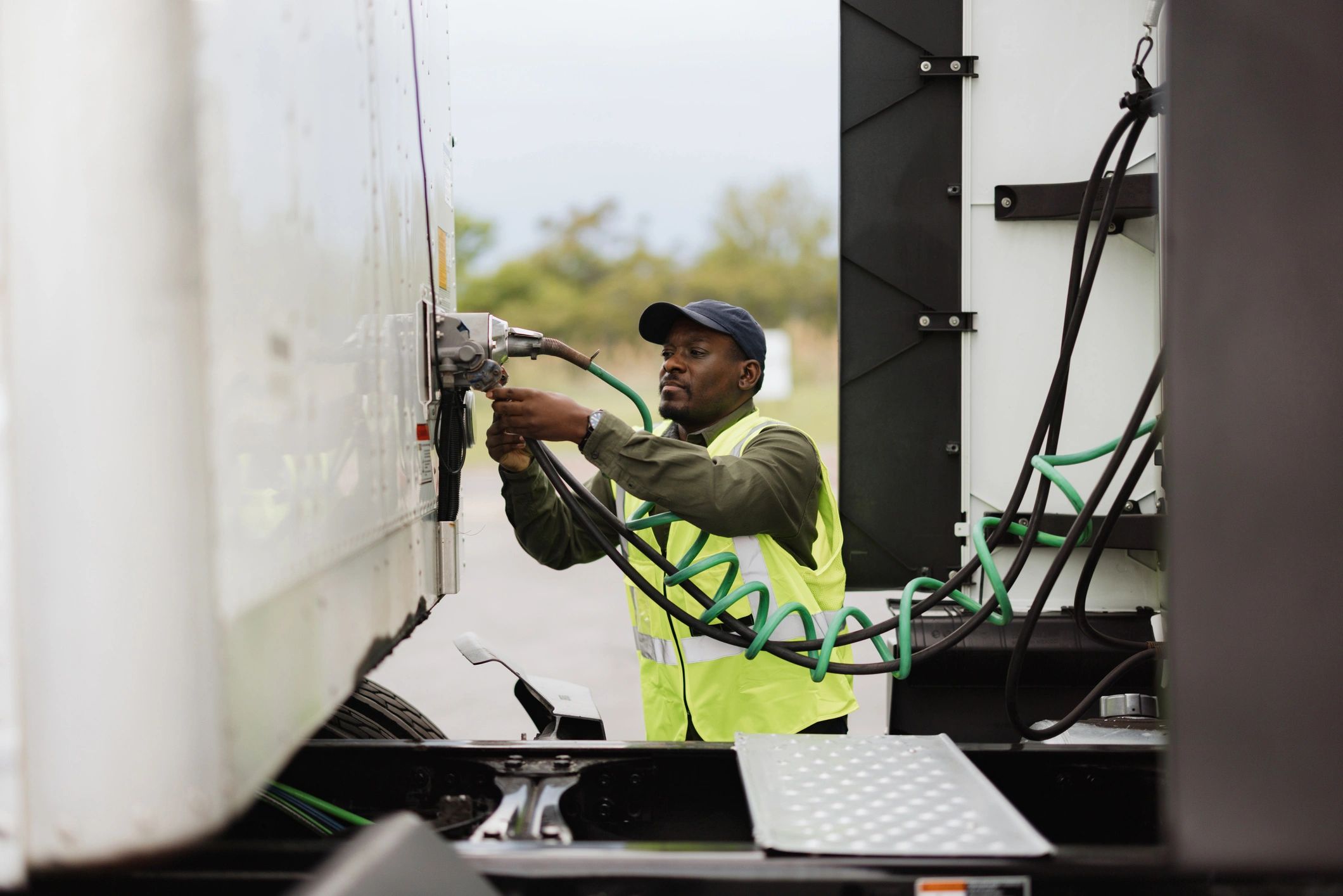 technician repairing truck fleet